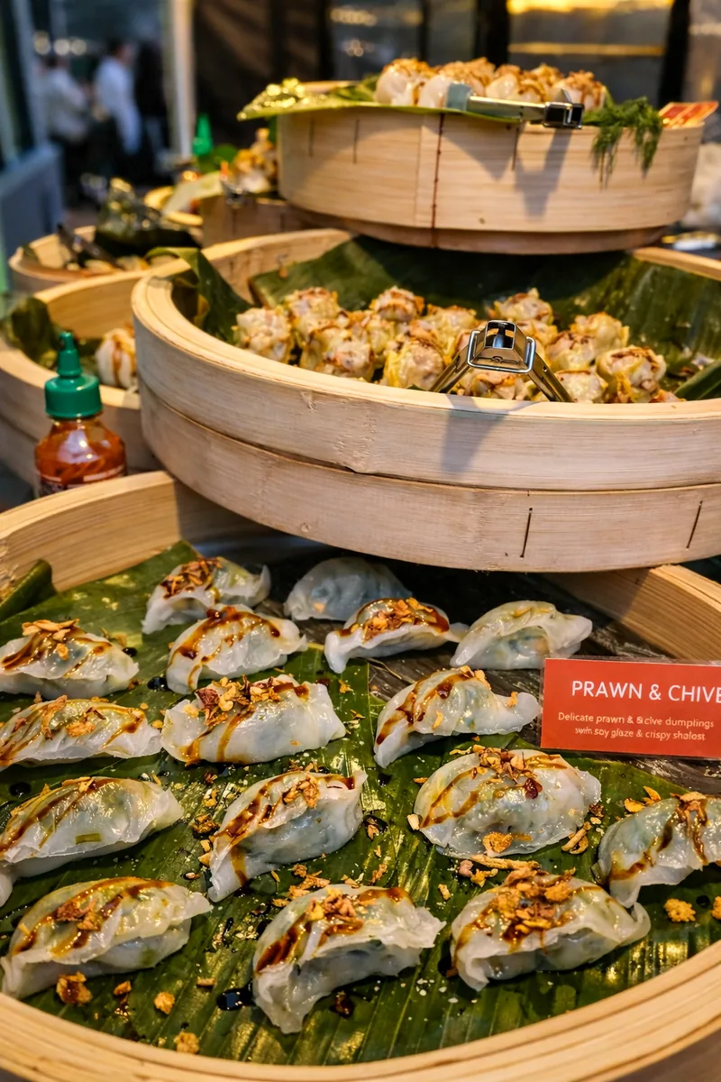 PUDB serving dumplings from bamboo steamers